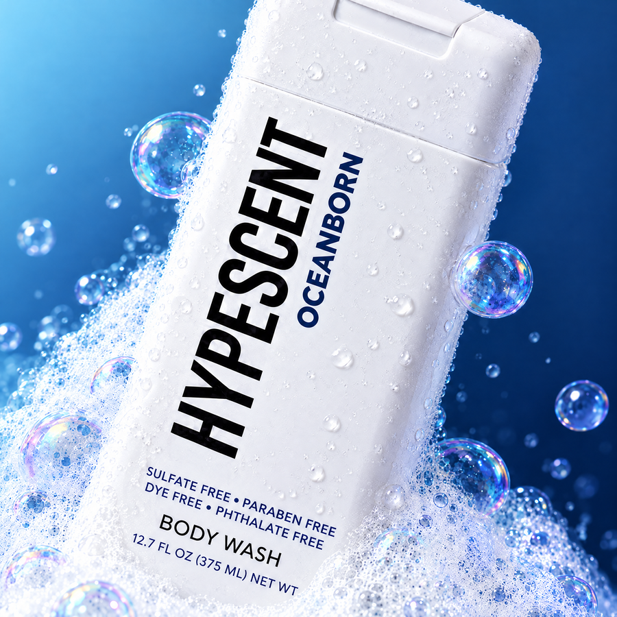 Close-up of the HYPESCENT Oceanborn body wash label with rich foam and bubbles