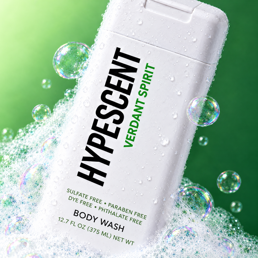Close-up of the HYPESCENT Verdant Spirit body wash label with rich foam and bubbles