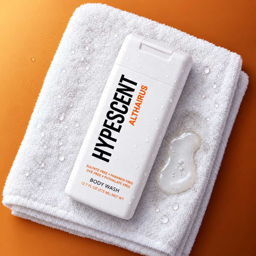 HYPESCENT Althaïrus body wash bottle on a white towel next to a drop of clear gel