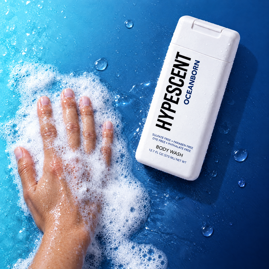 Hand lathering HYPESCENT Oceanborn body wash into a rich foam